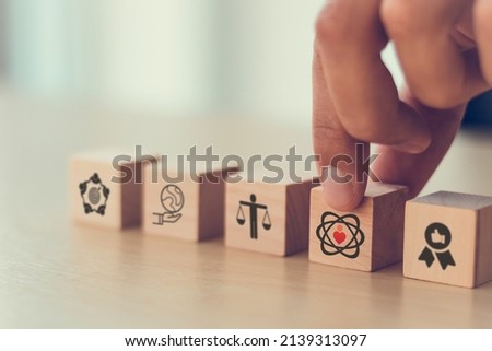 Core values,corporate values concept.  Company culture and strategy related to business, customer, people, company growth. Principles guide company's action. Core values icon on flat wood cube. Banner Сток-фото © 