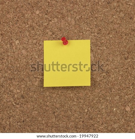 Bright Yellow Note on Cork Board