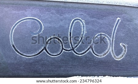 The inscription on the side window of the car - Inscription on frost - Cold label - White frost - Inscription by hand - Cold sign