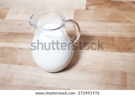 milk jug on table