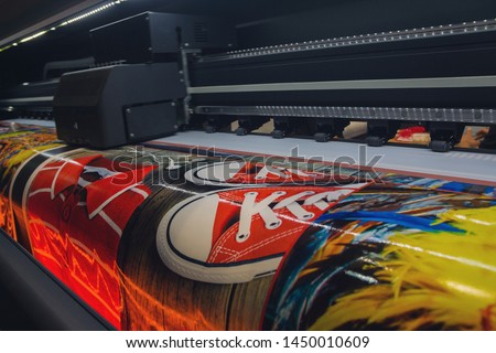 Image, Stock Photo large roll with red flex hose behind a deformed barrier