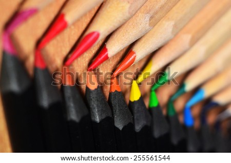 Pencils in Row/a set of pencils positioned in a row