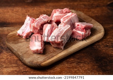 Similar – Image, Stock Photo raw pork tenderloin on a wooden cutting board