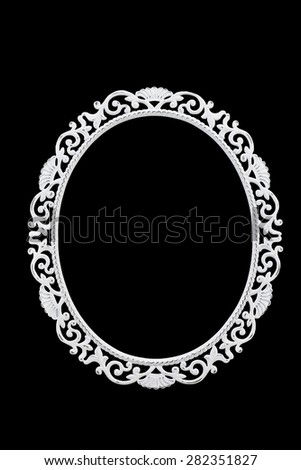 White delicate frame for photos on a black background