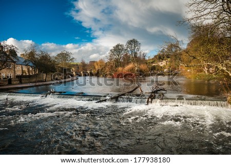 Rough, fast flowing high water on the river Wye, Bakewell after heavy rain and storms.