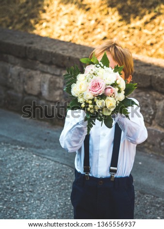 Similar – Foto Bild Kleiner eleganter Ringträger bei Gartenhochzeit