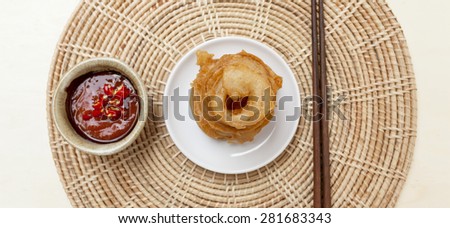 Onion ring with red chili sauce food banner style background