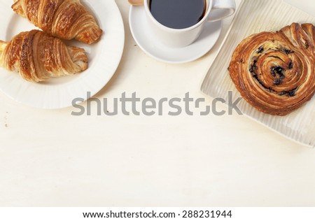 Breakfast background, Croissant and Chocolate danish with black coffee