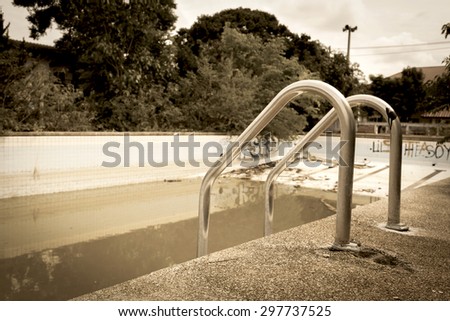 The old cement swimming pool vintage tone style