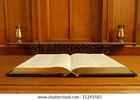 Old bible open in old chapel
