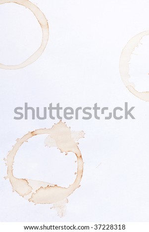 coffee ring stains on white paper background