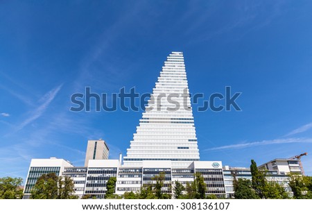 Basel, Switzerland - May 10, 2015 - Office building at the headquarter of the Swiss global health-care company Roche, which operates worldwide under two divisions: Pharmaceuticals and Diagnostics.