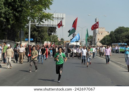 ISTANBUL, TURKEY -JUNE 07: Unidentified activists participate in a protest organized by Humanitarian Relief Foundation to commemorate Mavi Marmara raid on June 07,2010 in Istanbul,Turkey.