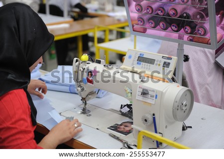 ISTANBUL, TURKEY - APRIL 24, 2011: unidentified workers are working in a textile factory on April 24, 2011 Istanbul,Turkey