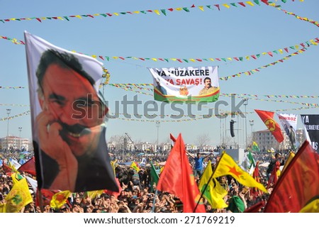 DIYARBAKIR,TURKEY - MARCH 21: Kurds celebrating their traditional feast Newroz that means \'new day\' in kurdish on March 21, 2014 in Diyarbakir, Turkey.