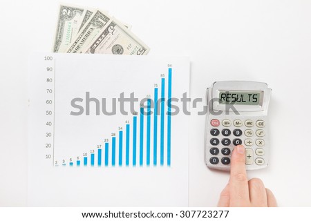 Results - Businessman counting losses and profit working with statistics, analyzing financial results