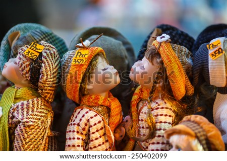 Prague, Czech Republic, January 03 2014: Czech national dolls on sale at a street market for tourists
