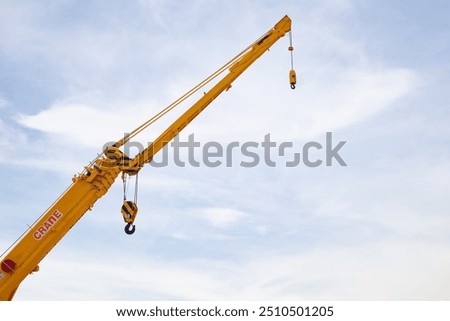 Image, Stock Photo Boom of a crane in front of colorful evening sky.