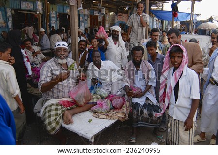 LAHIJ, YEMEN - SEPTEMBER 15, 2006: Unidentified men sell khat (Catha edulis) at the local market on September 15, 2006 in Lahij, Yemen. Chewing khat (drug of abuse) is a major social problem in Yemen.