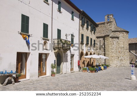 SAN LEO, ITALY - MAY 14, 2013: Exterior of the medieval town buildings of San Leo on May 14, 2013 in San Leo, Italy.