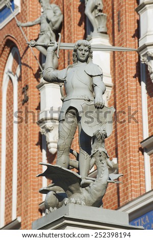 Statue of the knight defeating a dragon in front of the House of Blackheads in Riga, Latvia.