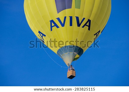 VILNIUS, LITHUANIA - APRIL 30, 2015: Unidentified people fly with the hot air balloon in Vilnius, Lithuania.