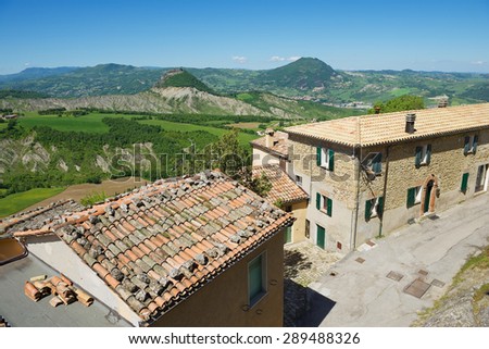 SAN LEO, ITALY - MAY 14, 2013: View to the old buildings of San Leo medieval town in San Leo, Italy.