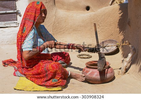 JAMBA, INDIA - APRIL 02, 2007: Unidentified blind woman does housework in Jamba, India.