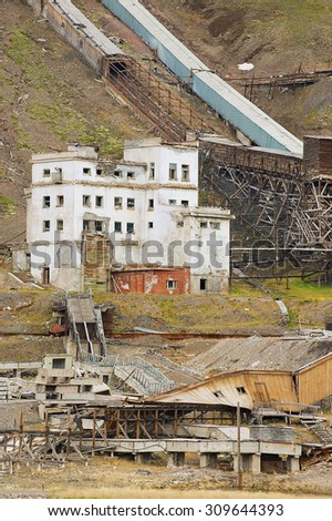 PYRAMIDEN, NORWAY - SEPTEMBER 03, 2011: View to the ruined coal mine in the abandoned Russian arctic settlement Pyramiden, Norway.