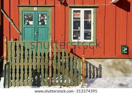 TROMSO, NORWAY - MARCH 29, 2011: Souvenir shop entrance in downtown Tromso in Tromso, Norway.