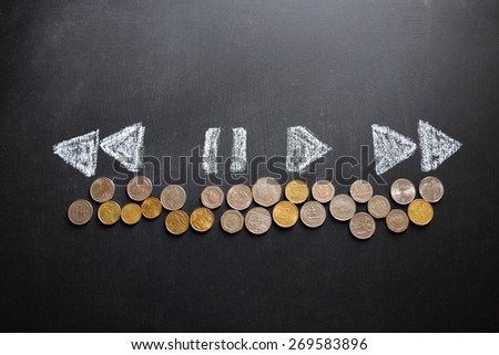 Money concept designed on black background like a system that can play, stop, rewind or reverse. Different foreign currencies are here. Hand drawing drawn by colored chalk. Financial background.