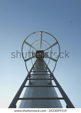 Similar – Image, Stock Photo Lonely blue steel railing with concrete foundation alone in front of a blue sky in sunshine in Oelde near Warendorf in Westphalia in the Münsterland region of Germany