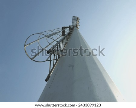 Similar – Image, Stock Photo Lonely blue steel railing with concrete foundation alone in front of a blue sky in sunshine in Oelde near Warendorf in Westphalia in the Münsterland region of Germany