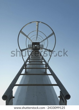 Similar – Image, Stock Photo Lonely blue steel railing with concrete foundation alone in front of a blue sky in sunshine in Oelde near Warendorf in Westphalia in the Münsterland region of Germany