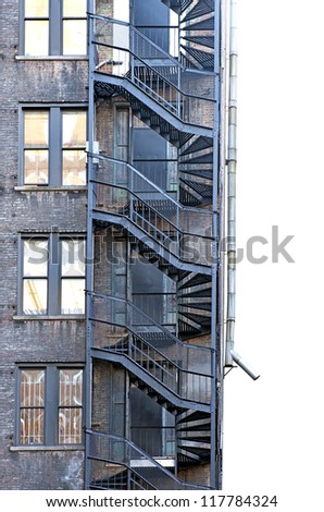 fire escape on run down building with brick wall