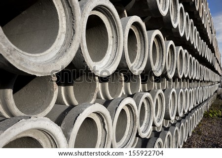 Stack of concrete drainage pipes with diminishing perspective