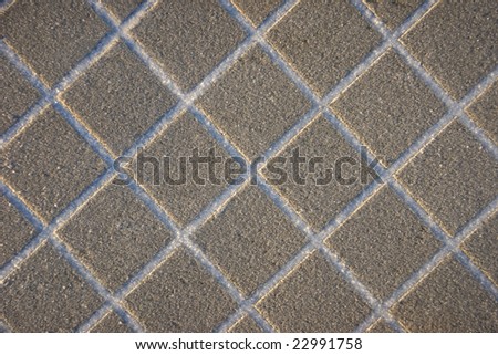 Floor tiles with snow in the gaps