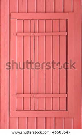 Wooden door painted in red