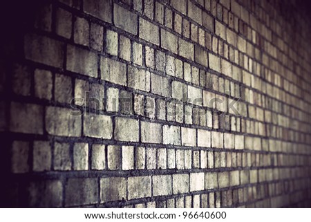 grunge brick wall with diminishing perspective