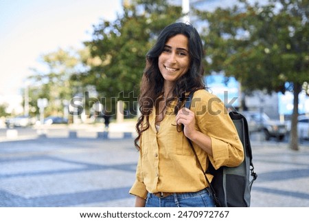 Similar – Image, Stock Photo Young female in yellow shirt sitting in her sewing workshop in front of the colorful threads and sewing machines