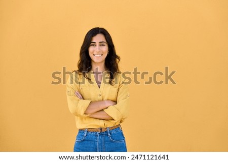 Similar – Image, Stock Photo Young casual female traveler at airport, holding smart phone device, looking through the airport gate windows at planes on airport runway.