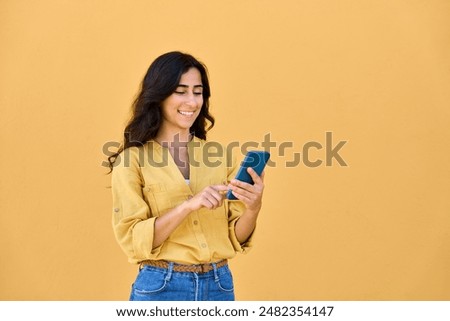 Similar – Image, Stock Photo Young female in yellow shirt sitting in her sewing workshop in front of the colorful threads and sewing machines