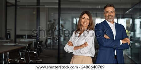 Similar – Image, Stock Photo Senior businesswoman standing in office