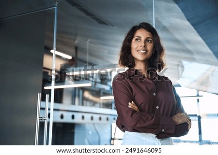 Similar – Image, Stock Photo Portrait of confident mid adult Chinese woman looking at camera and smiling in coworking space