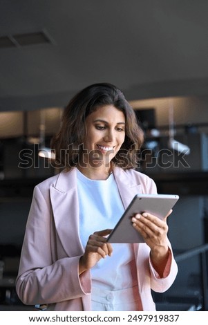 Similar – Foto Bild Muslimische Frau mit Tablet auf der Couch