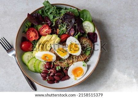 Similar – Image, Stock Photo Medium boiled eggs with sasld, healthy breakfast