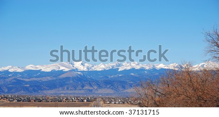 The Rocky Mountains in Colorado rise above the eastern prairie.