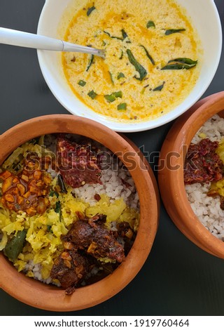 Nadal chatty choru moru or kerala special food includes pickles, onion chutney, cabbage, and a morh curry Zdjęcia stock © 