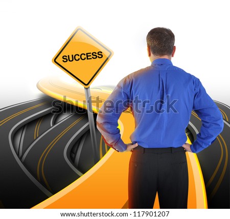 A business man is standing in front of a golden road with a yellow success sign to represent his path decision.
