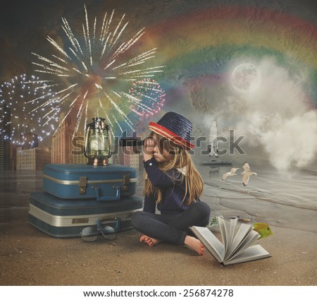 A little girl at the beach is looking through a magnifying telescope at fireworks in the sky with a map and rainbow in the background for a travel imagination concept.